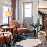 Two Leather chairs along with Desk in the Sitting Area